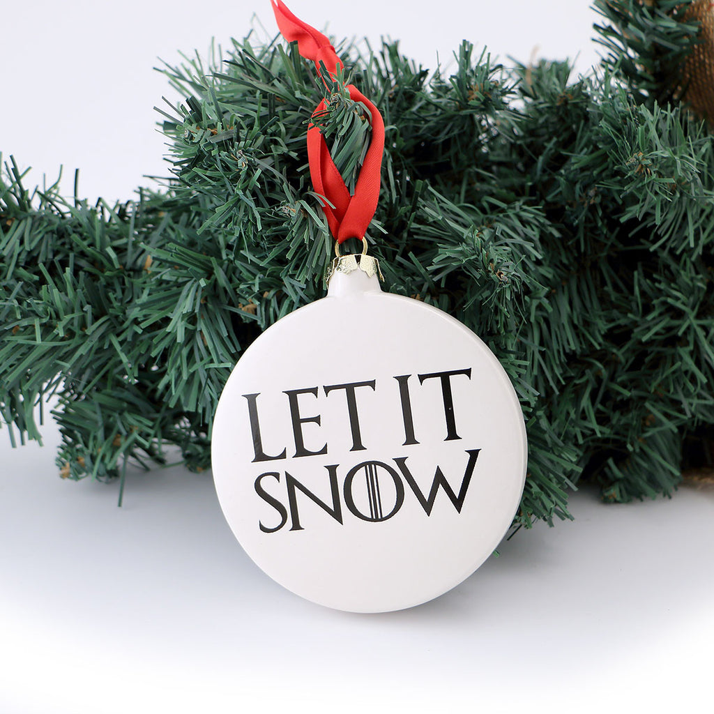 
Double sided ornament feature Game of Thrones Direwolf and "LET IT SNOW" on reverse side.
Winter i