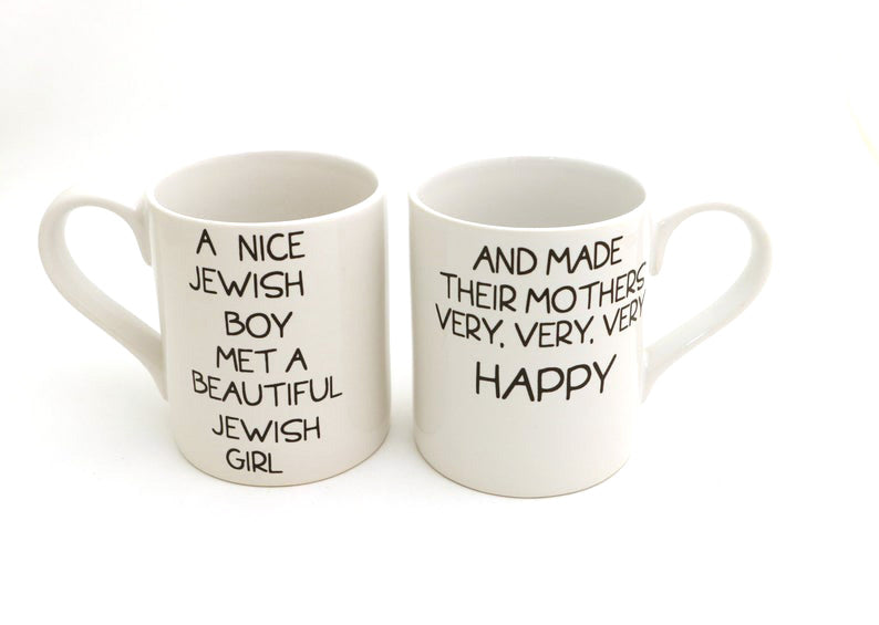 
You won't kvetch about this double sided set of mugs. Fronts read: A beautiful Jewish Girl met a n