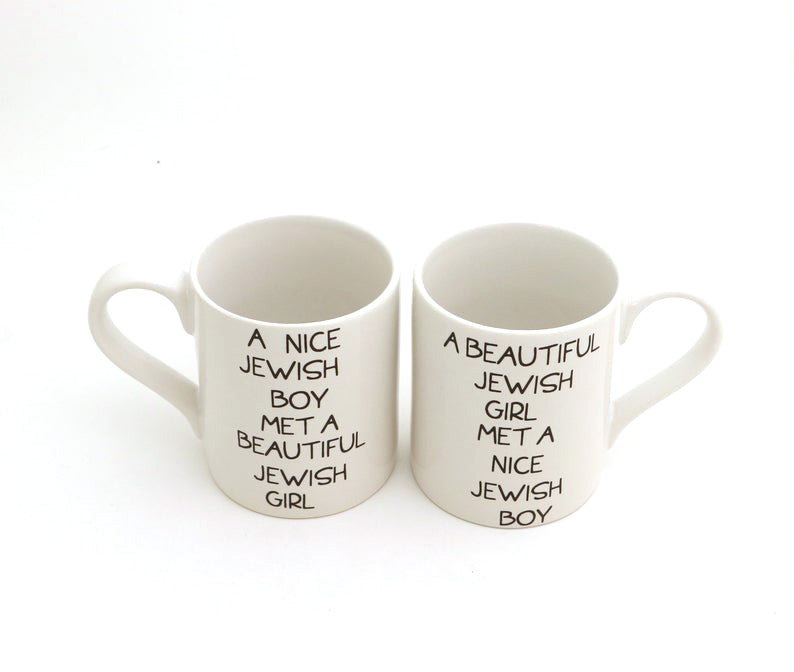 
You won't kvetch about this double sided set of mugs. Fronts read: A beautiful Jewish Girl met a n